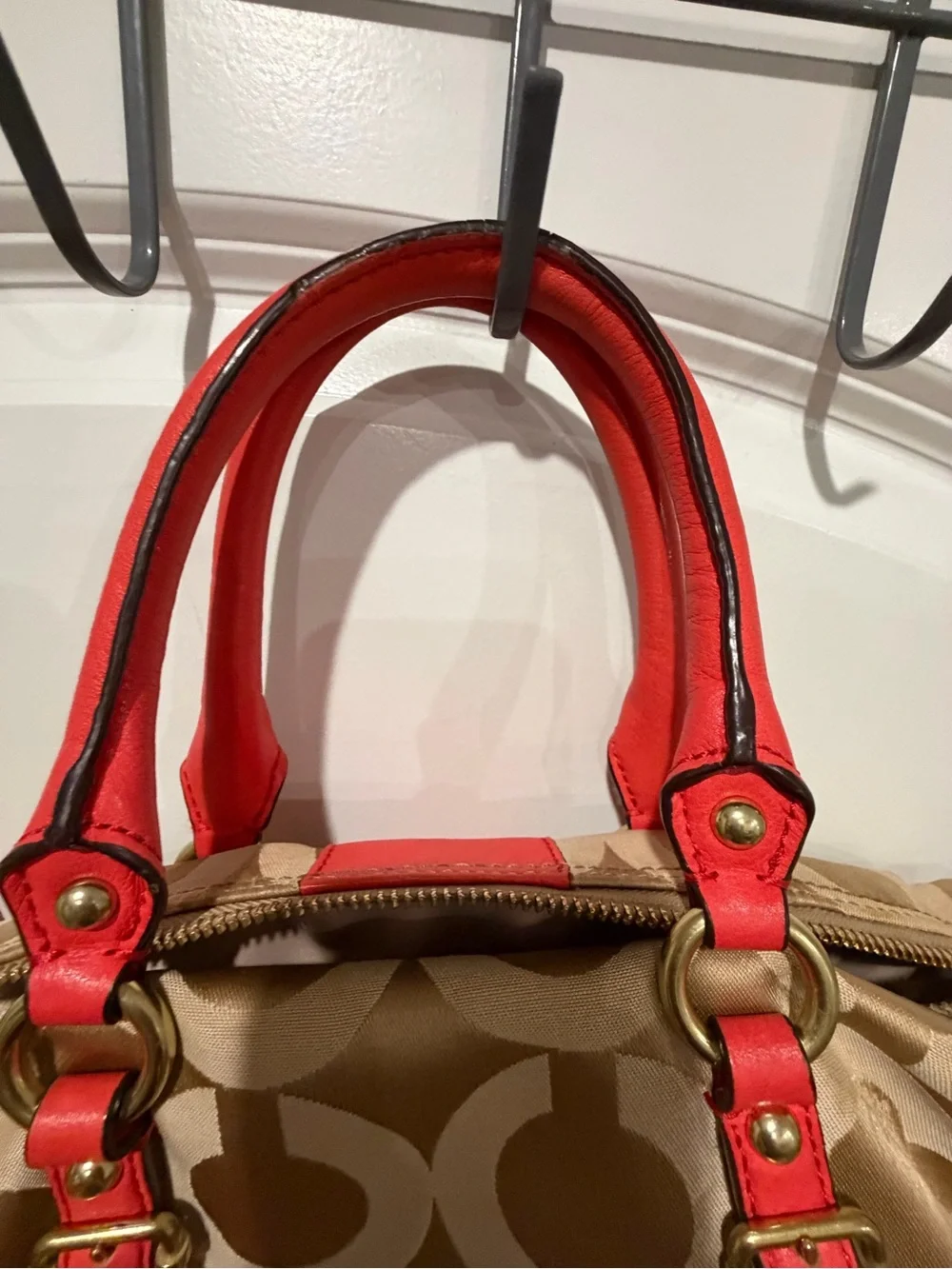 Coach Beige Signature Canvas Satchel with orange Trim and Handles. No strap